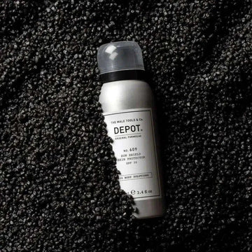 Depot No. 609 Sun Shield Skin Protector SPF 30, 100ml bottle on textured surface.
