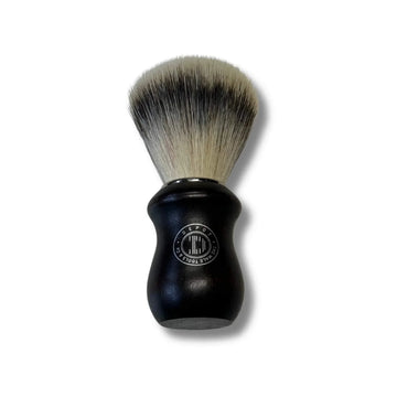 Wooden shaving brush with soft bristles and elegant handle.