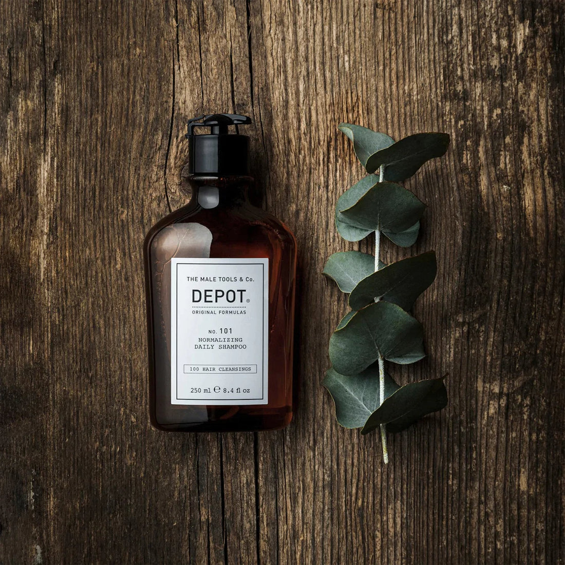 Depot No. 101 Normalizing Daily Shampoo bottle, 250 ml, designed to normalize oily scalp and hair, featuring ingredients like tea tree oil and rosemary.